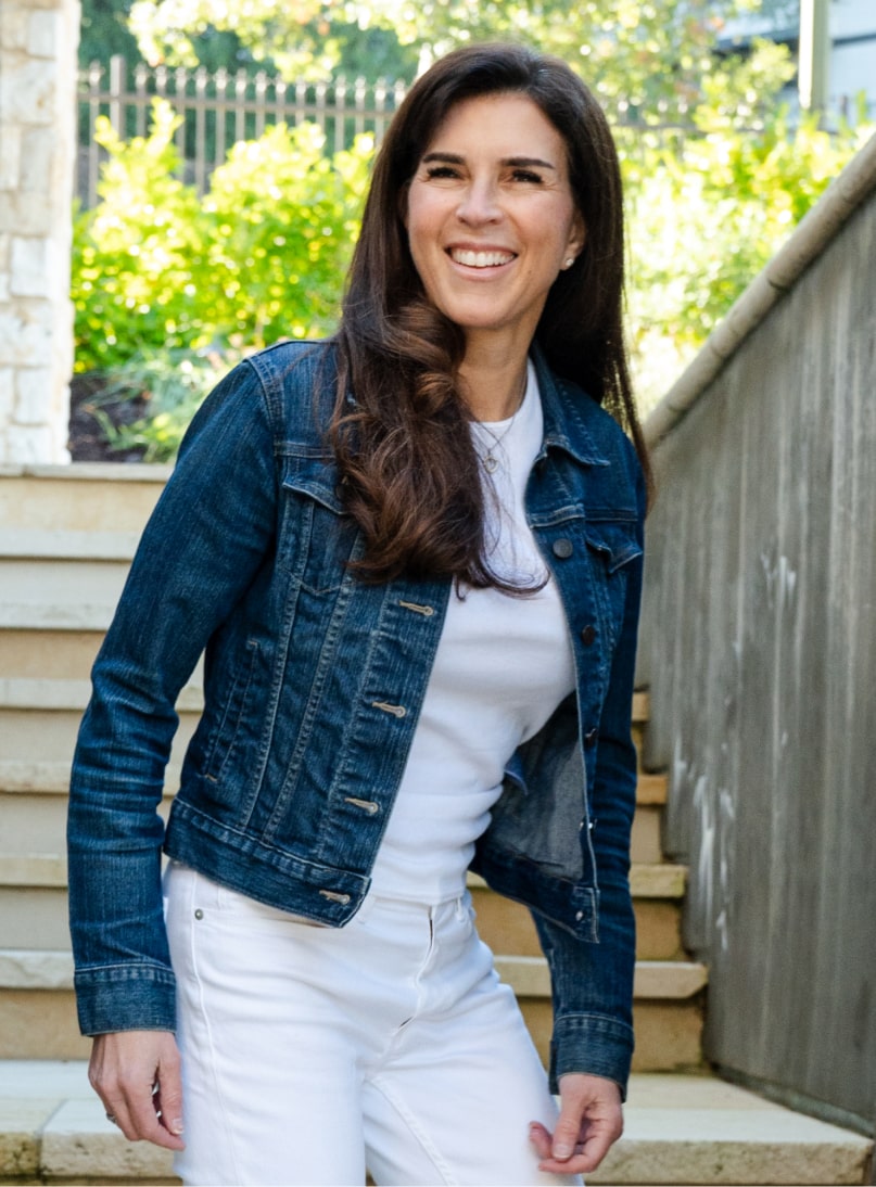 Kelley standing on stairs